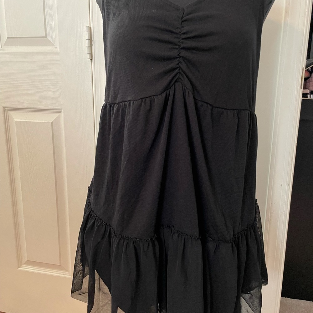 Black tank tiered with mesh